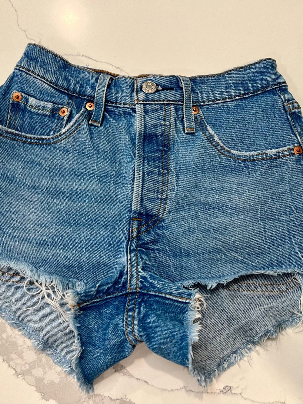 Levi's Light Blue Distressed Denim Cutoff Shorts